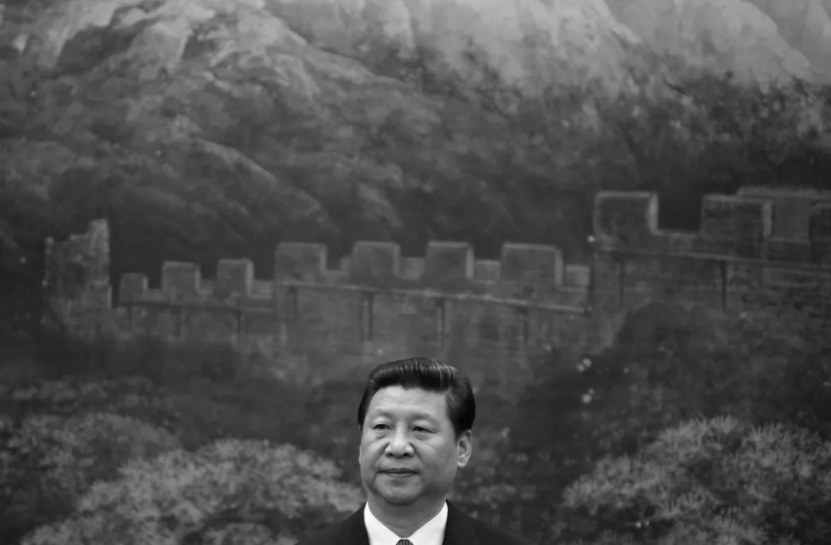 Chinese Communist Party leader Xi Jinping looks on during a signing ceremony with Palestinian President Mahmoud Abbas at the Great Hall of the People on May 6, 2013 in Beijing. A new exposé reveals a very different version of the Party's history from the one edited by Xi in 2011. (Jason Lee-Pool/Getty Images)