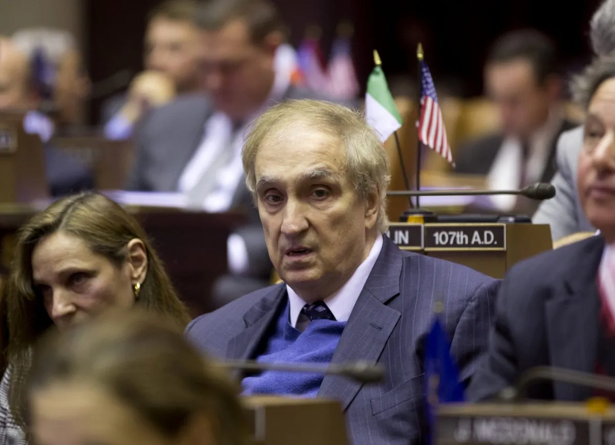This Jan. 14, 2013 photo, Assemblyman Vito Lopez sits during a session at the Capitol in Albany, N.Y.   A New York prosecutor decided Wednesday, May 15, 2013,  that Lopez's behavior toward women on his staff was "alarming" rather than criminal harassment, but lambasted Albany leaders as too interested in protecting themselves and said their secretive, back-door behavior encouraged his inappropriate conduct. Staten Island District Attorney Daniel Donovan said his office did more than 50 interviews but there was no basis to conclude a chargeable offense was committed. He also found no criminal activity in the secret settling and confidentiality agreements of some of the complaints made against Lopez, but sharply criticized Albany's handling of it.  (AP Photo/Mike Groll)