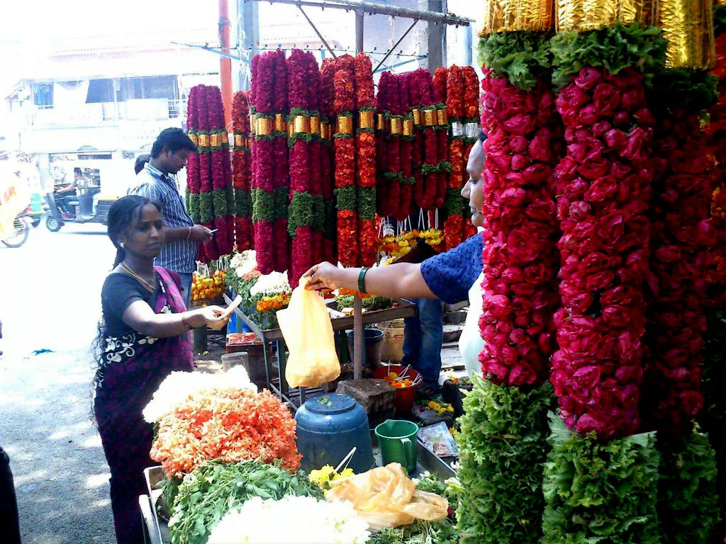 A flower Vendor, Varalakshmi, sells flowers in Ulsoor locality of Bangalore city, India. She has been selling flowers for the past 25 years. (Tarun Bhalla)