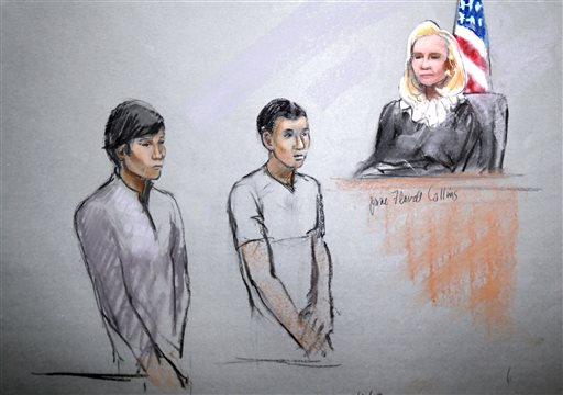 This courtroom sketch shows defendants Dias Kadyrbayev, left, and Azamat Tazhayakov appearing in front of Federal Magistrate Marianne Bowler at the Moakley Federal Courthouse in Boston, Mass., Wednesday, May 1, 2013.
