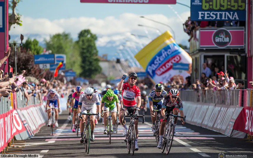 Mark Cavendish of Omega Pharma-Quickstep crosses the finish line first in Stage Thirteeen of the 2013 Giro d’Italia. (omegapharma-quickstep.com)