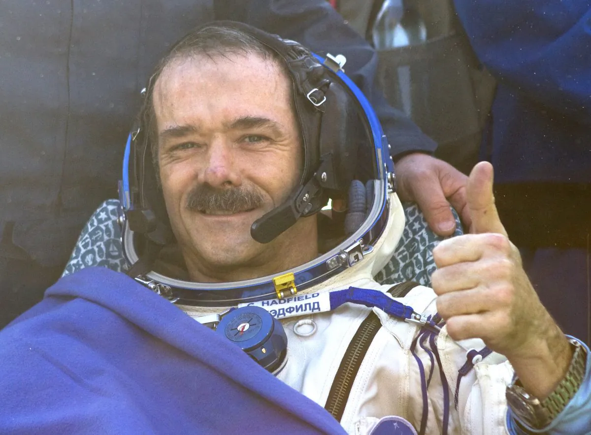 Canadian spaceman Chris Hadfield gives a thumbs up shortly after his landing aboard the Russian Soyuz space capsule in central Kazakhstan on May 13, 2013. Hadfield became an international celebrity with his tweets from space and cover of David Bowie's "Space Oddity."
(Sergei Remezov/AFP/Getty Images)