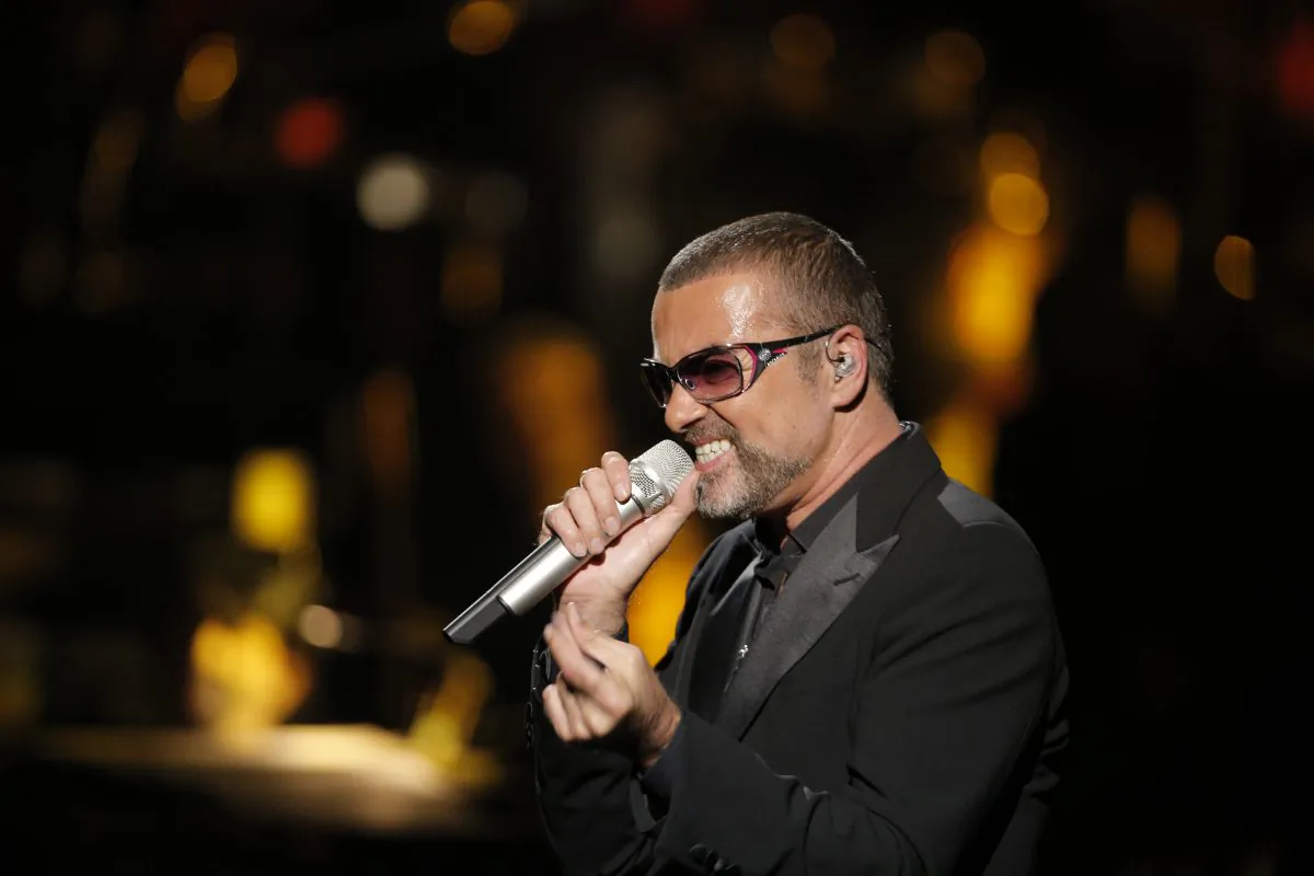In this Sept. 9, 2012 file photo, British singer George Michael performs at a concert to raise money for AIDS charity Sidaction, during the Symphonica tour at Palais Garnier Opera house in Paris, France. (AP Photo/Francois Mori, File)