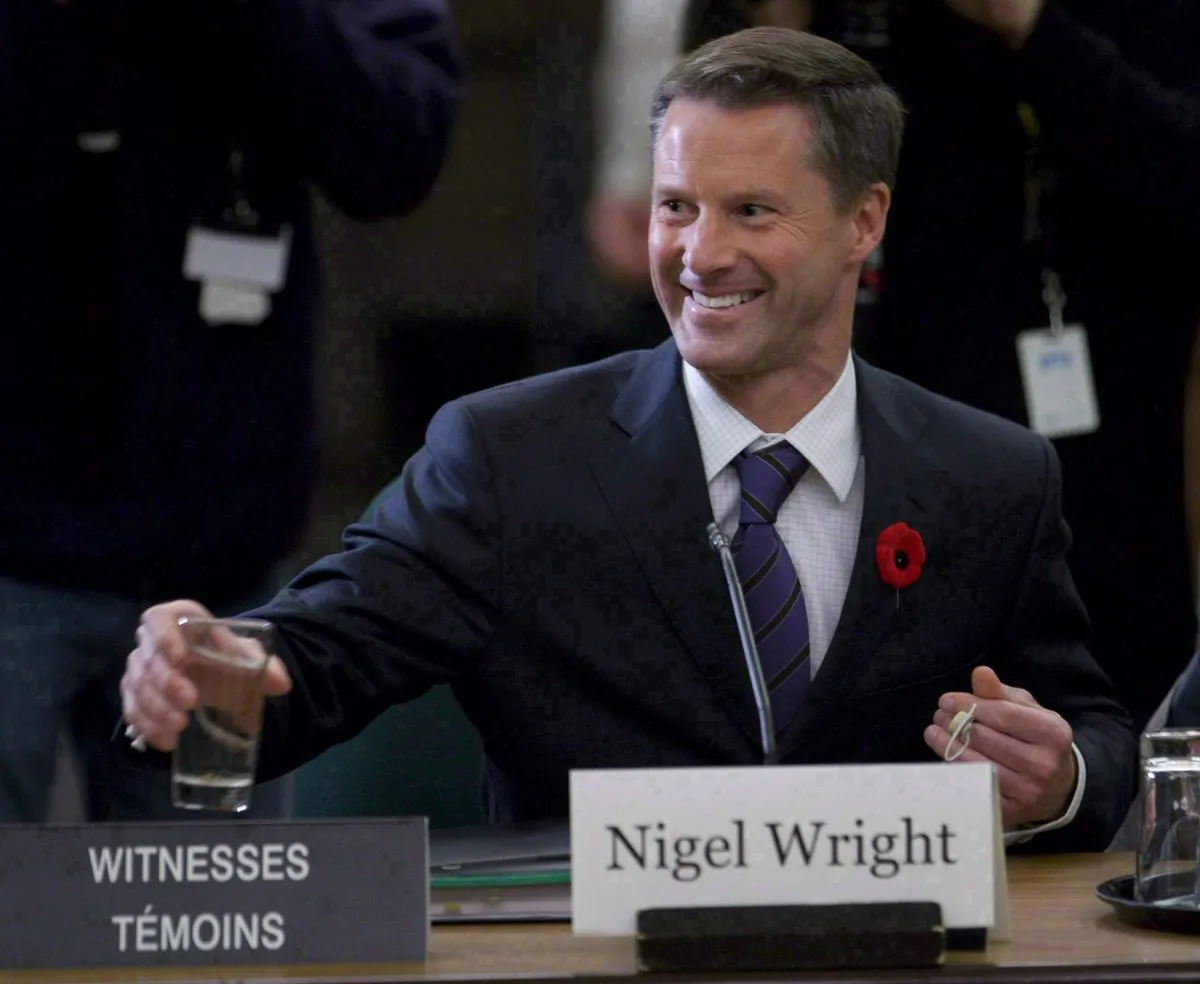 Nigel Wright, chief of staff for Prime Minister Stephen Harper, appears as a witness at the Standing Committee on Access to Information, Privacy and Ethics on Parliament Hill in November 2010. Wright personally footed the $90,000 bill for embattled Sen. Mike Duffy's improper housing expenses. Harper spokesman Andrew MacDougall says Duffy was unable to come up with the money following an external audit, so Wright stepped in. (THE CANADIAN PRESS/Adrian Wyld)