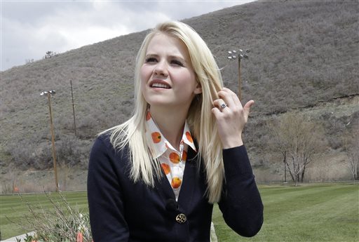 Elizabeth Smart looks on before an interview Tuesday, May 7, 2013, in Park City, Utah. Smart said she's elated to hear about three Cleveland women who escaped Monday after they disappeared a decade ago. Smart was kidnapped from her bedroom in Salt Lake City when she was 14. She was freed nine months later when she was found walking with her captor on a suburban street in March 2003. (AP Photo/Rick Bowmer)