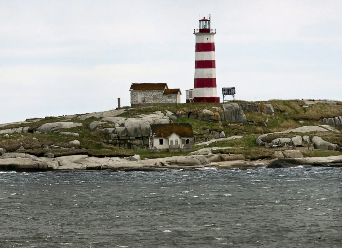 The Sambro Island lighthouse is the oldest operating lighthouse in North America. Sambro, like 970 other lighthouses across Canada, has been declared surplus by the federal Fisheries Department. (THE CANADIAN PRESS/Andrew Vaughan)