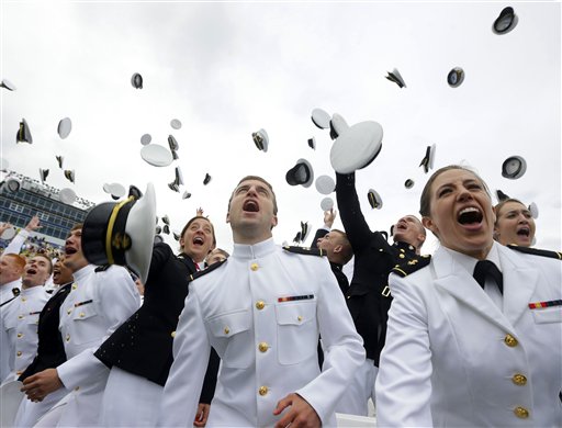 Members of the 2013 graduating class of the United States Naval Academy throw their caps into the air marking the end of their commencement ceremony in Annapolis, Md,. Friday, May 24, 2013, where President Barack Obama spoke. (AP Photo/Pablo Martinez Monsivais)