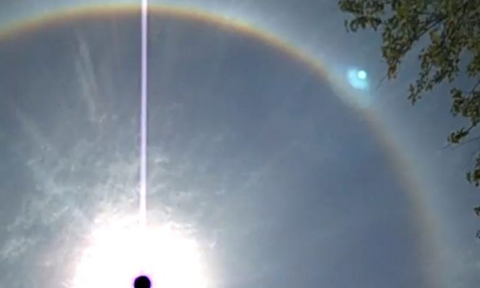 A YouTube screenshot shows a ring around the sun in Long Branch, New Jersey.