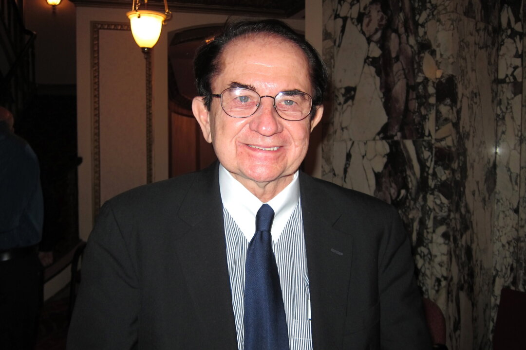 Dr. Robert Gasior enjoys Shen Yun Performing Arts at Chicago's Cadillac Palace Theatre, on Sunday, May 12. (Valerie Avore/The Epoch Times)