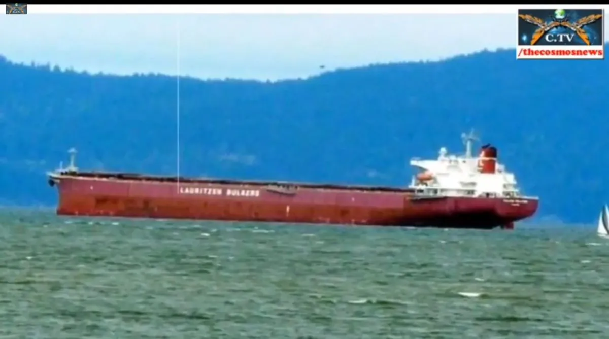 A screenshot of YouTube shows a purported UFO over mountains in Vancouver.