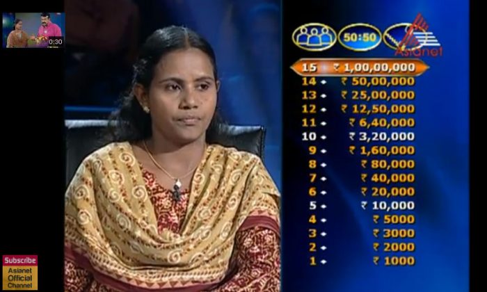 A screen shot in which Sanuja Rajan is seen answering questions on the reality show “Ningalkkumaakam Kodeeswaran” aired on Asianet TV, Kerala, India. She won the prize money of $1,86,289. (The Epoch Times)