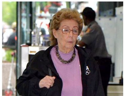 Jacqueline Goldberg, 87, leaves the federal building May 17, 2013, in Chicago after testifying in a lawsuit against Donald Trump. On Monday, May 20, 2013, Goldberg, who alleged during a court appearance that Trump cheated her in a bait-and-switch scheme, has told jurors she had qualms about suing the developer-turned-TV star given his power and influence. Goldberg says "The Apprentice" star enticed her into buying two condos at Chicago's Trump International Hotel & Tower with an offer to share profits of the entire building. (AP Photo/Chicago Sun-Times, Scott Stewart)