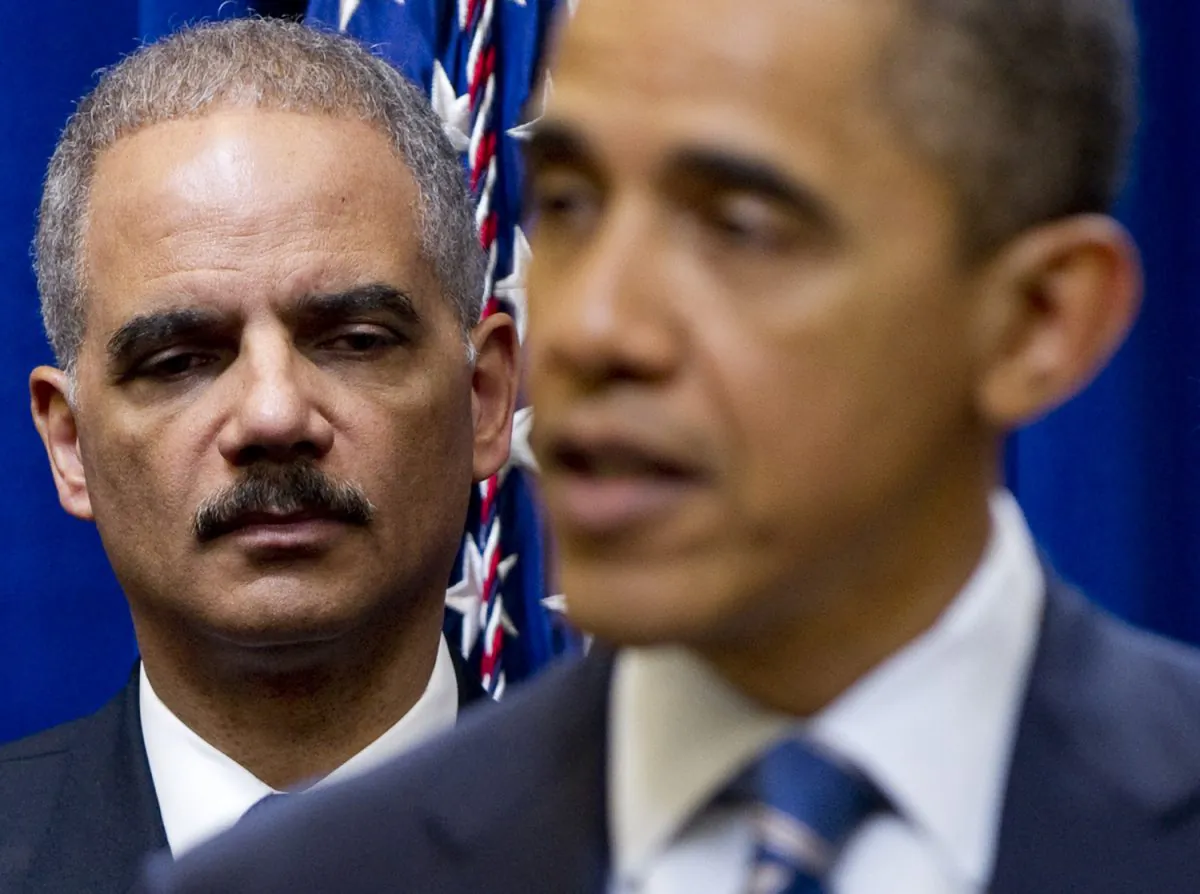 President Barack Obama speaks beside Attorney General Eric Holder (L) in Washington about the home loan mortgage settlement between U.S. states and leading banks, Feb. 9, 2012. Holder recently voiced his concern about the fear of prosecuting “too big to fail” banks at a March 6 hearing before the Senate Judiciary Committee.
(Saul Loeb/AFP/Getty Images)