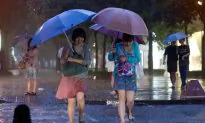 Beijing Tries Safety Nets for Manholes