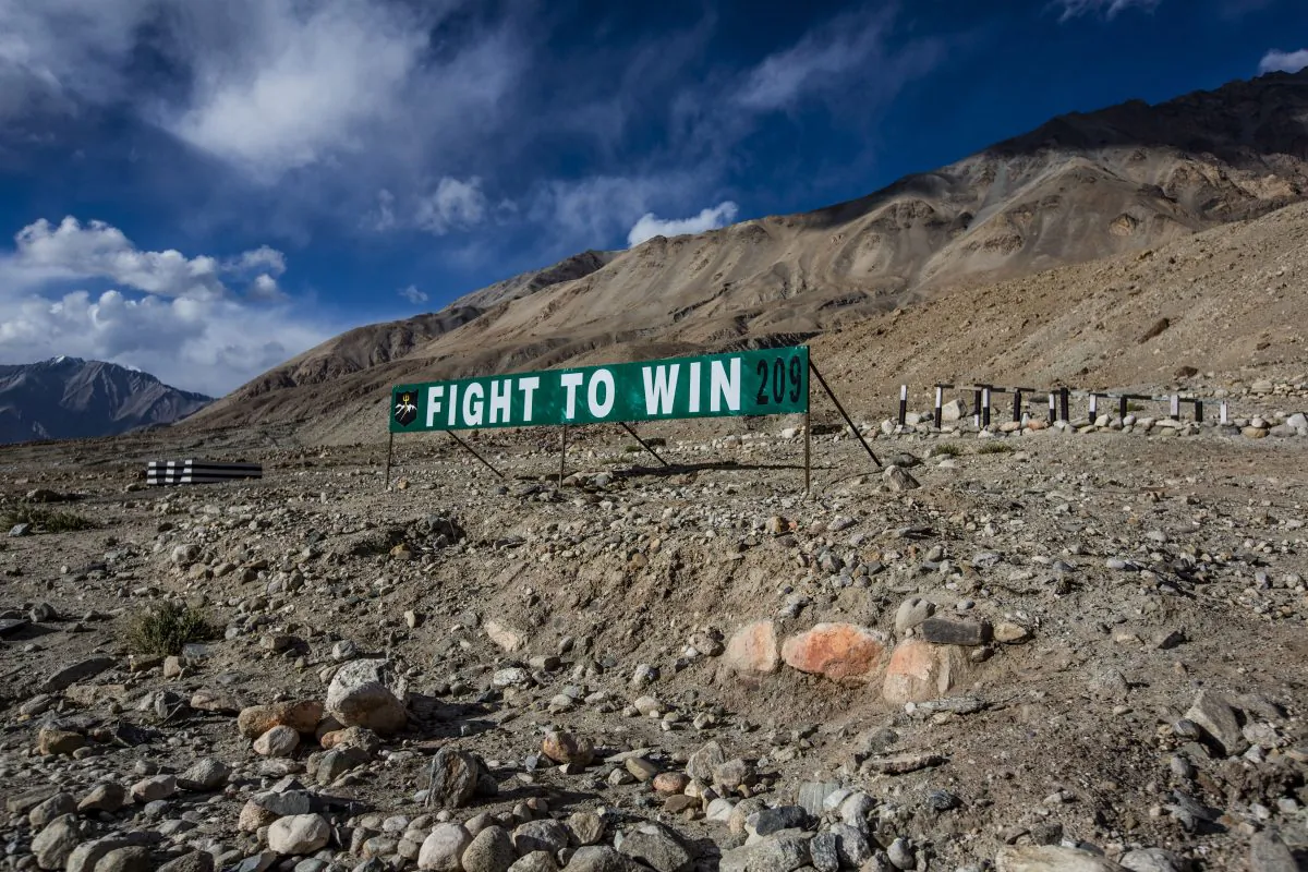 An Indian Military banner post is seen on the road to Pangong Lake on October 5, 2012 near to Leh, Ladakh, India. Ladakh, nestled between the Kunlun mountain range in the north and the main Great Himalayas to the south, was once an ancient Buddhist Kingdom and for over half a century now, a strategic military outpost for India. Recently there was a stand-off between India and China’s militaries in the region.(Daniel Berehulak/Getty Images)