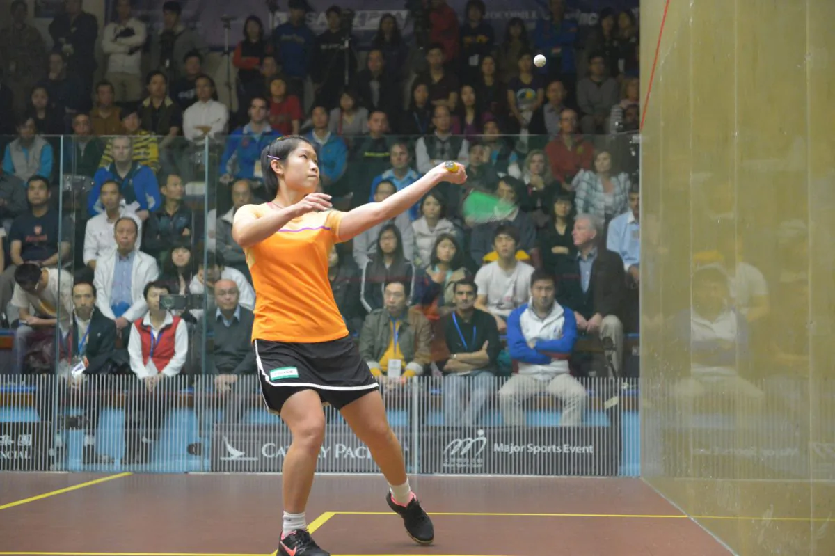 Top seed … Annie Au is No.1 seed in the women’s section of the Crocodile Hong Kong Squash Championships that is currently in progress at the Hong Kong Squash Centre. Quarter Finals of the men's competition are played tonight, Thursday June 20, 2013; both Semi-finals take place Friday June 21; and the Finals are on Saturday afternoon June 22. (Bill Cox/Epoch Times)