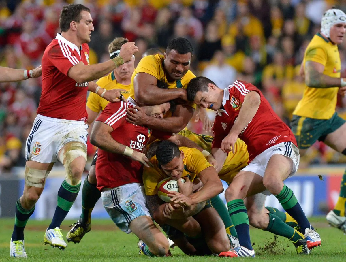 The intensity of international rugby ... Wallabies wing Israel Folau is tackled during the First Test match between the Australian Wallabies and the British & Irish Lions at Suncorp Stadium on June 22, 2013 in Brisbane. (Bradley Kanaris/Getty Images)
