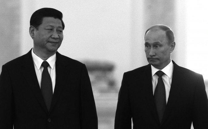 Russia's President Vladimir Putin (R) and Chinese Chairman Xi Jinping meet in the Grand Kremlin Palace in Moscow, on March 22, 2013. An effort by Xi Jinping at the summit to gain Russian support for Chinese claims in the South China Sea failed. (Sergei Karpukhin/AFP/Getty Images)