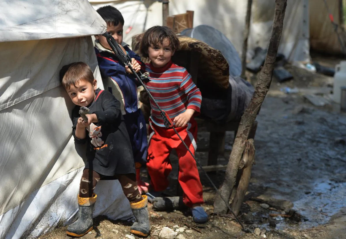 Syrian children are seen at a make-shift refugee camp some kilometers away from the Syria-Turkey border. Thousands of children are confirmed to have died in the fighting in Syria since last summer (Miguael Medina /AFP/Getty Images)