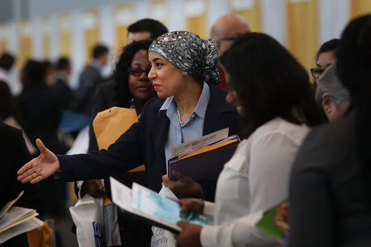 Job seekers meet with employers at the 25th Annual CUNY big Apple Job and Internship Fair at the Jacob Javits Convention Center on April 26 in New York City. Despite efforts unemployment among young people ages 18-29 remains high.  (Spencer Platt/Getty Images)