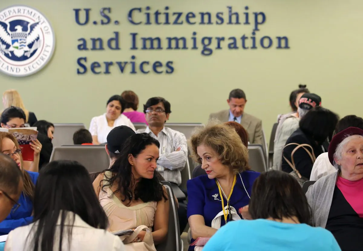 Immigrants wait for interviews at the U.S. Citizenship and Immigration Services Queens office in the Long Island City neighborhood of New York City, N.Y., on May 30, 2013. (John Moore/Getty Images)