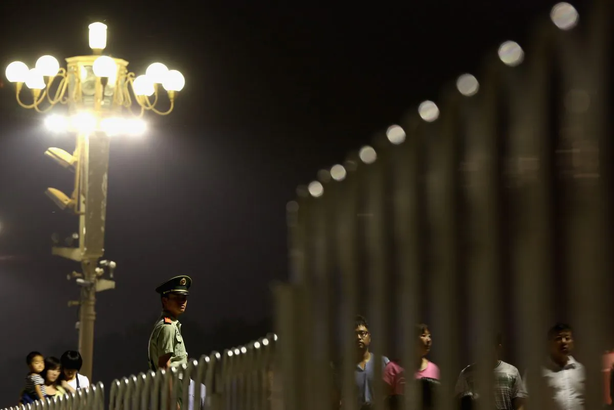 A Chinese paramilitary policeman stands guard on Tiananmen Square on June 3, 2013, in Beijing. (Feng Li/Getty Images)