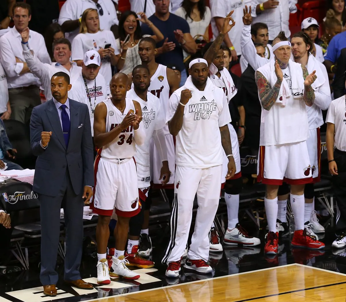 Juwan Howard, Ray Allen #34, Dwyane Wade #3, LeBron James #6 and Chris Andersen #11 of the Miami Heat celebrate from the bench in the fourth quarter while taking on the San Antonio Spurs during Game Two of the 2013 NBA Finals at AmericanAirlines Arena on June 9, 2013 in Miami, Florida. (Mike Ehrmann/Getty Images)