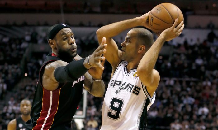 Tony Parker #9 of the San Antonio Spurs with the ball against LeBron James #6 of the Miami Heat during Game Five of the 2013 NBA Finals at the AT&T Center on June 16, 2013 in San Antonio, Texas. (Kevin C. Cox/Getty Images)