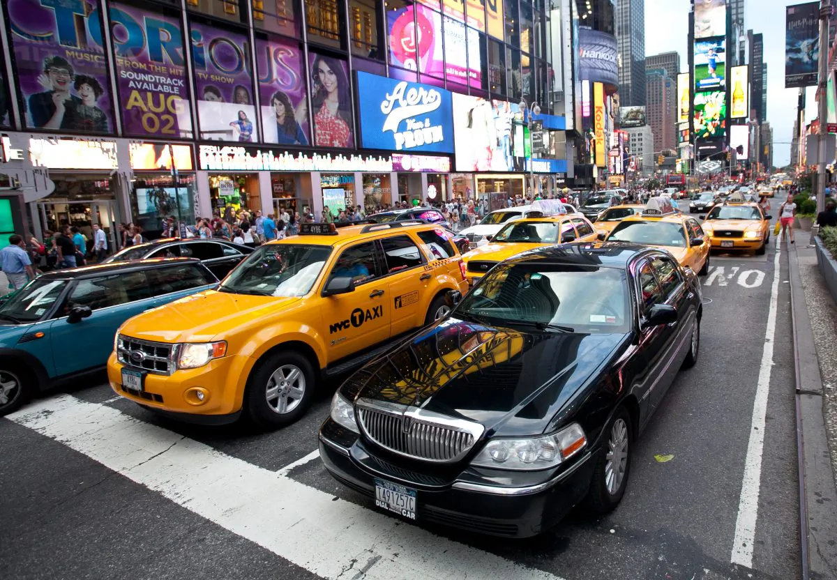 A file photo of a livery cab next to a taxi cab on 6th Ave in Manhattan. (The Epoch Times)