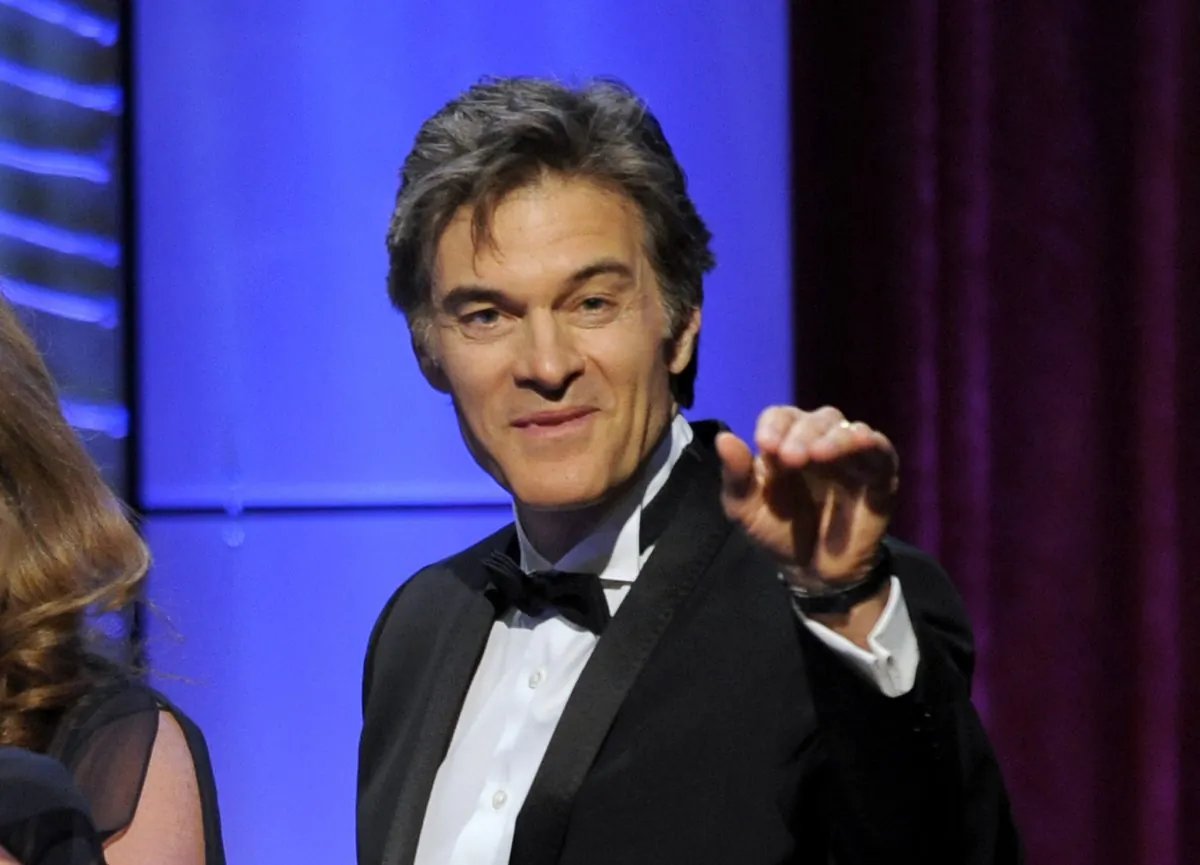 This  file photo shows Mehmet Oz, aka Dr. Oz, accepting the award for outstanding talk show for "The Dr. Oz Show" at the 40th Annual Daytime Emmy Awards in Beverly Hills, Calif., June 16, 2013.  (Photo by Chris Pizzello/Invision/AP, file)