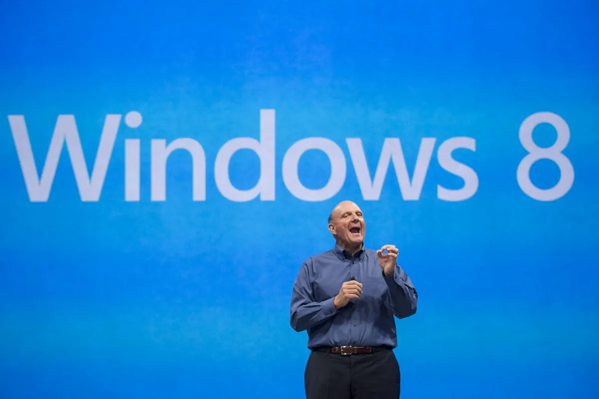 In this 2012 file photo, Microsoft CEO Steve Ballmer comments on the Windows 8 operating system. Ballmer announced that he would retiring from Microsoft within a year. (AP Photo/Damian Dovarganes)