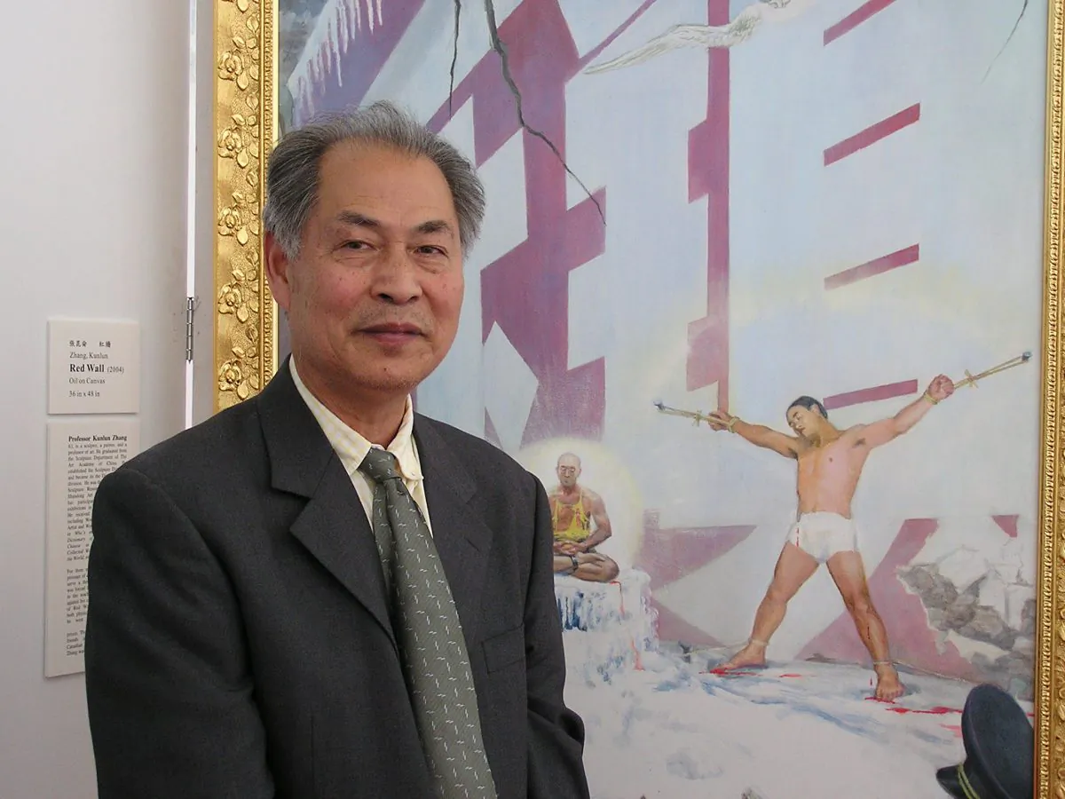 Former Art Professor Zhang Kunlun is pictured standing in front of his Painting "Red Wall." Zhang said this painting is a realistic portrait of some of the torture methods used on Falun Gong practitioners incarcerated in China's forced labor camps, but in general it also represents the torture and terror that 1.3 billion Chinese people have been subjected to since the Chinese Communist Party seized power. (Epoch Times)
