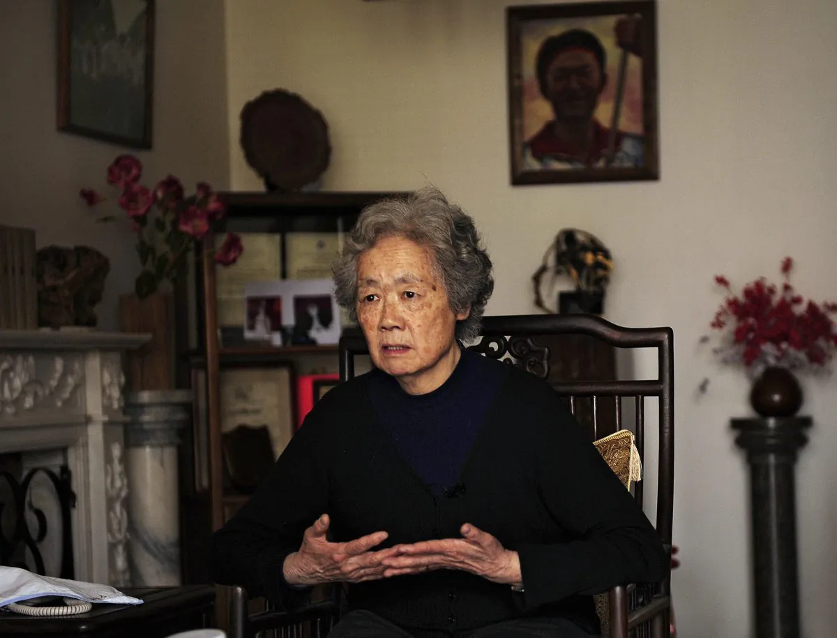 Ding Zilin, the founder of the Tiananmen Mothers, speaks with reporters on April 7, 2009, in her home. Ding discussed the death of her teenage son, who was shot on Tiananmen Square. (Peter Parks/AFP/Getty Images) 