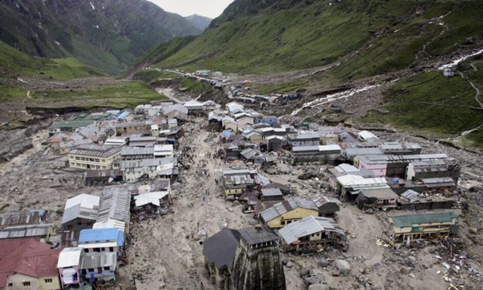 A view of the Hindu holy town of Kedarnath from a helicopter after a flood, in Uttarakhand State, India, Tuesday, June 18, 2013. Poor planning hampered rescue operations, say experts,  which continue on June 24 in northern India where more than 1,000 people are said to have died in landslides and flash floods. (AP Photo)