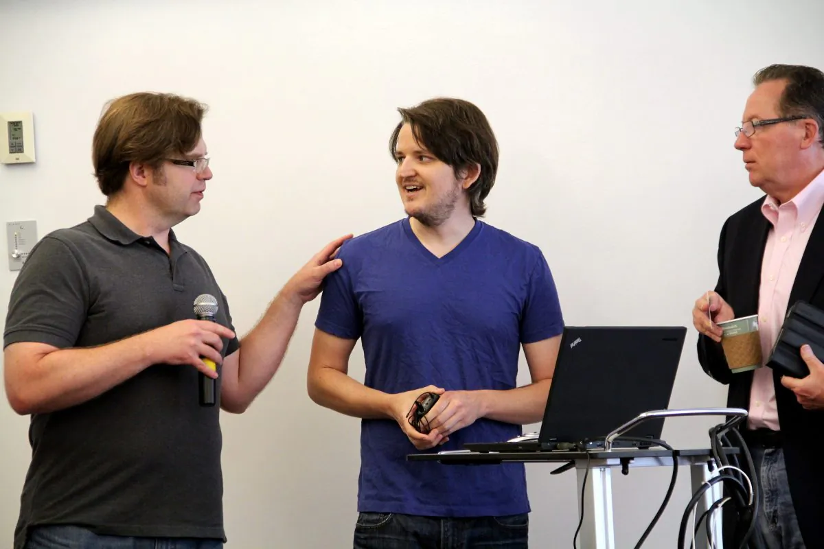 Ben Kittrell (center), from doodlkit.com after giving a presentation at the Kauffman Foundation's weekly 1 Million Cups event in Kansas City. (Shar Adams/The Epoch Times)