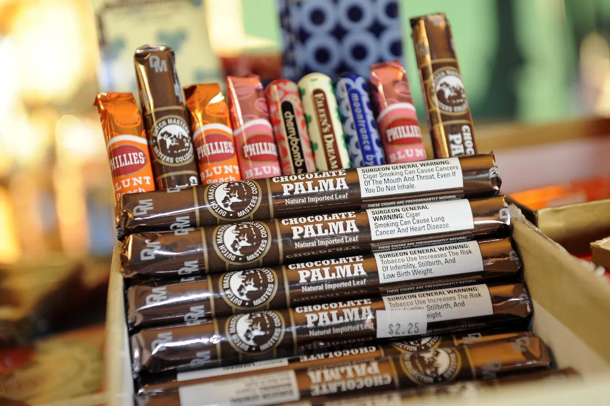 Candy-flavored cigars appear on display at a custom tobacco shop in Albany, N.Y., on May 31. The American Cancer Society is pushing to make New York the first state to enact a comprehensive restriction on the sale of candy-and fruit-flavored cigarillos, chewing tobacco, and tobacco used in water pipes. (AP Photo/Hans Pennink)