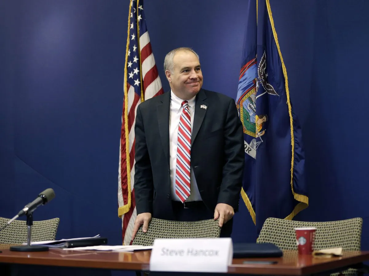 New York State Comptroller Thomas DiNapoli waits for a news conference to begin on Monday, Jan. 7, 2013, in Albany, NY. (AP Photo/Mike Groll)