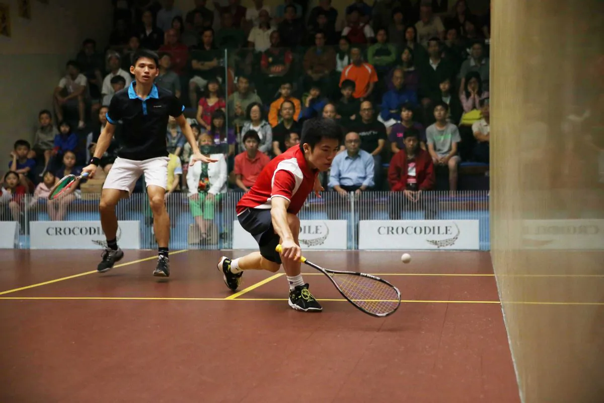 Leo Au preparing to play a front corner drop shot in the Final of the Crocodile Hong Kong Squash Championships against Max Lee on Saturday June 22. Au won this encounter to win the tournament for the second consecutive time. (Hong Kong Squash)