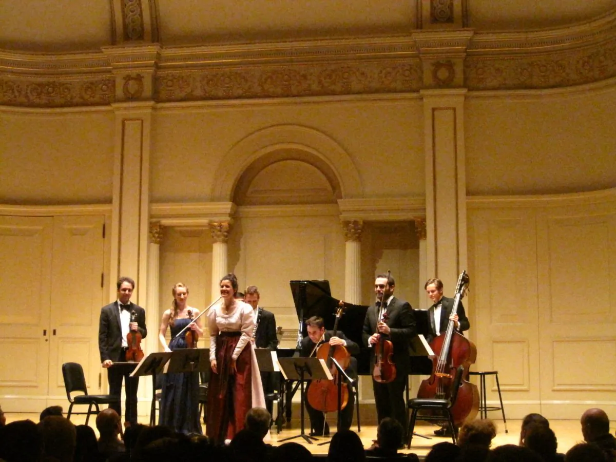 The Gustav Mahler String Quartet playing at Carnegie Hall on June 1. (L–R) Jesús Reina, Anna Margrethe Nilsen, Thérèse Mahler, Simon Reitmaier, Andrew Janss, Jesús Rodolfo Rodriguez, and Taddes Korris. (Amelia Pang/The Epoch Times)