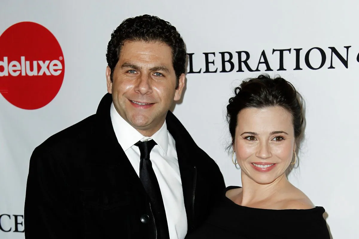 Actress Linda Cardellini (R) and Steven Rodriguez (L) arrive at the March of Dimes 6th Annual Celebration of Babies Luncheon in Beverly Hills, Calif., Friday, Dec. 2, 2011. The couple got engaged June 7, 2013. (AP Photo/Matt Sayles)