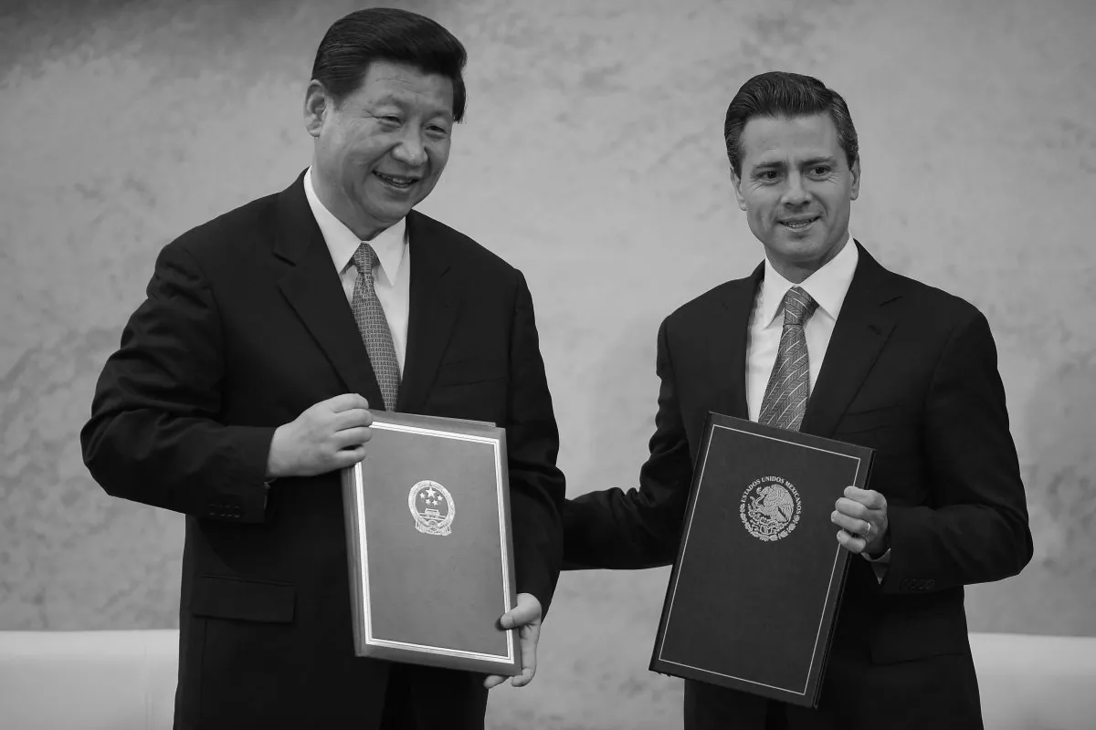 Mexican President Enrique Pena Nieto (R) and his Chinese counterpart Xi Jinping pose after signing agreements at the Los Pinos presidential residence in Mexico City, on June 4, 2013. Mexico is seeking to close a huge trade imbalance with China. (Alfredo Estrella/AFP/Getty Images) 