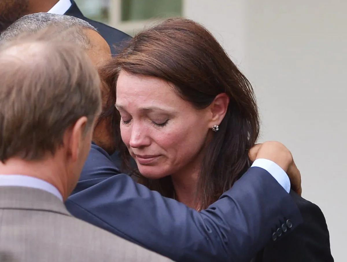 A file photo of U.S. President Barack Obama hugs Nicole Hockley, the mother of Newtown shooting victim Dylan, after speaking on gun control, in the Rose Garden of the White House in Washington, D.C., on April 17, 2013. Hockley is back at the Capitol to discuss gun control and for a remembrance ceremonies for the six-month anniversary of the shooting on June 13–14, 2013. (Mandel Ngan/AFP/Getty Images) 