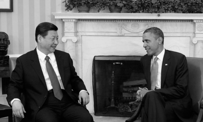 US President Barack Obama and Chinese Vice Chairman Xi Jinping speak during meetings in the White House Oval Office in Washington on Feb. 14, 2012. (Chip Somodevilla/Getty Images)