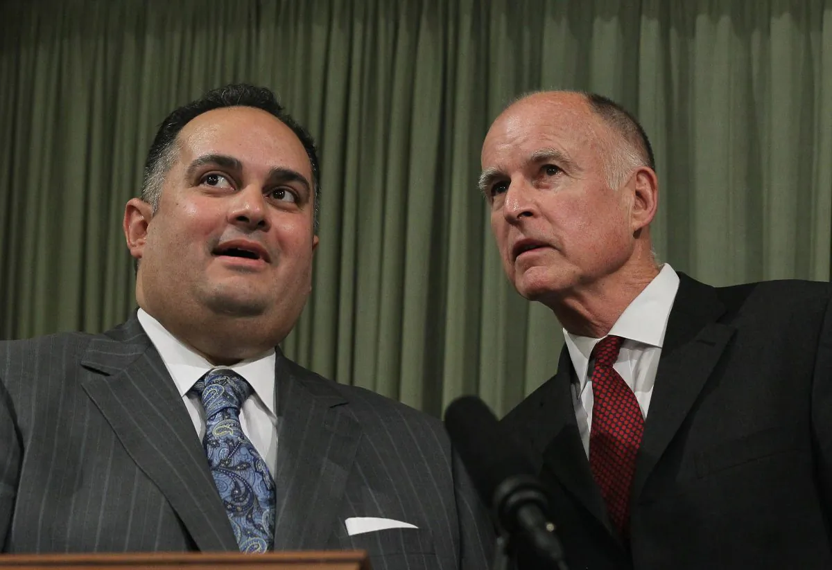 California Governor Jerry Brown (R) looks on with Speaker of the Assembly John Pérez (L) before delivering the State of the State Address at the California State Capitol in Sacramento, Calif., Jan. 31, 2011. (Justin Sullivan/Getty Images)