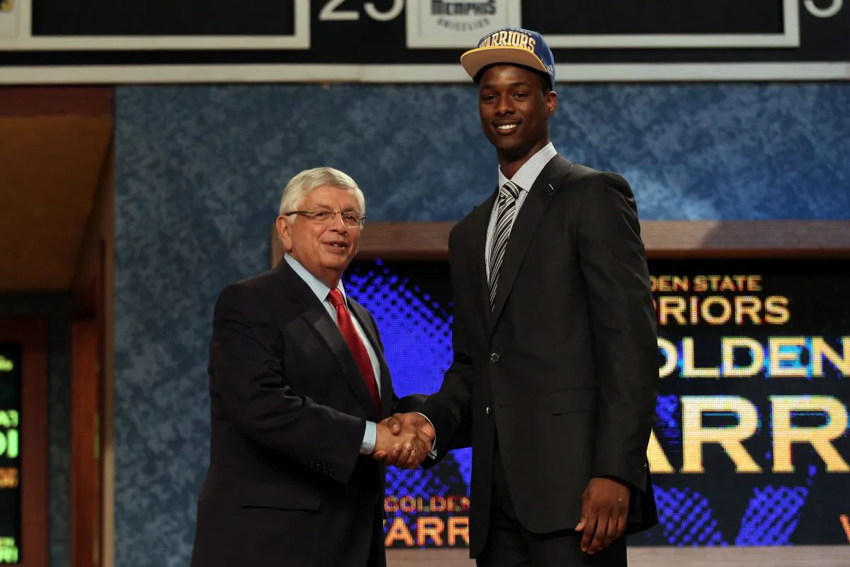 Harrison Barnes (R) of North Carolina greets NBA Commissioner David Stern (L) after he was selected number seven overall by the Golden State Warriors during the first round of the 2012 NBA Draft at Prudential Center on June 28, 2012 in Newark, New Jersey. (Elsa/Getty Images)