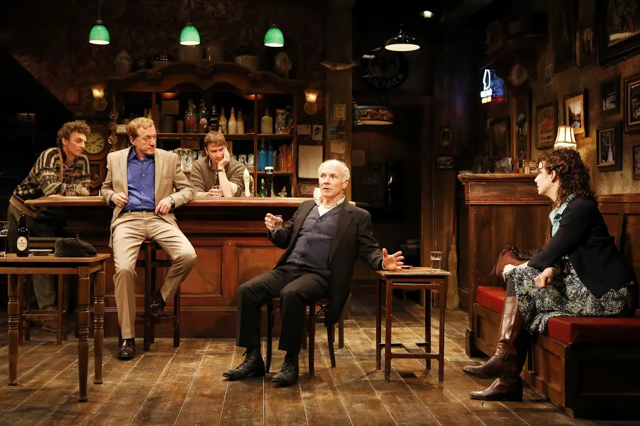 (L–R) John Keating (Jim), Sean Gormley (Finbar), Billy Carter (Brendan), Dan Butler (Jack), and Tessa Klein (Valerie) in Conor McPherson’s “The Weir.” (Carol Rosegg)
