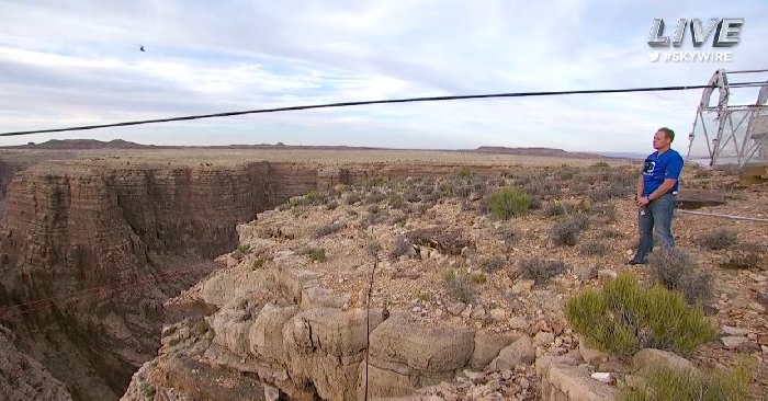 Nik Wallenda stares out over the ravine in the Grand Canyon he just crossed on June 23, 2013. (Screenshot/Discovery Channel)