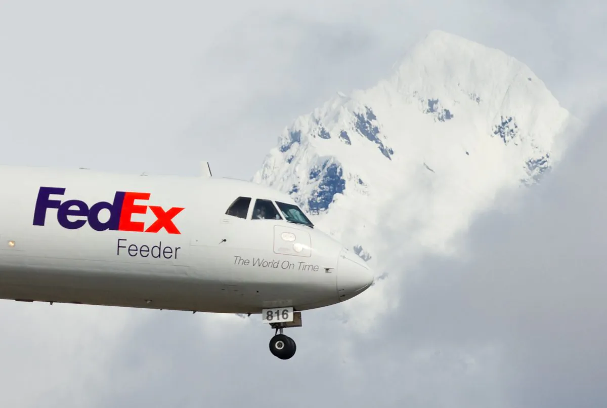 A FedEx cargo planes comes in for a landing at the Juneau International Airport in Juneau, Alaska, on April 23, 2013. (The Juneau Empire, Michael Penn/AP Photo)