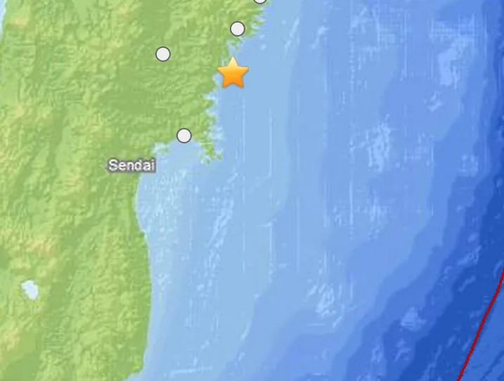 A screenshot of the USGS website shows where the earthquake struck off the coast of Japan.