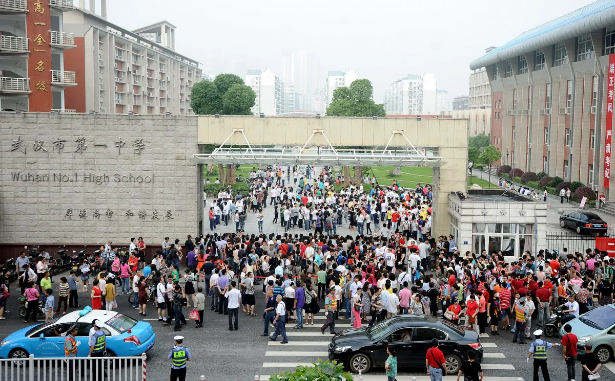 Chinese students arrive for the first day of the Gaokao in Wuhan on June 7, 2012. New security checks to prevent cheating mean female students in Jilin Province cannot wear underwire bras during China’s upcoming college entrance exams. (STR/AFP/GettyImages)